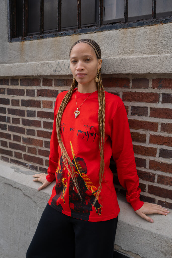 CHRISTIAN SCOTT VS CHIEF ADJUAH LONG SLEEVE (RED)