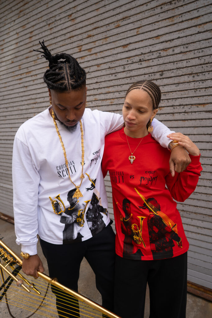 CHRISTIAN SCOTT VS CHIEF ADJUAH LONG SLEEVE (WHITE) & CHRISTIAN SCOTT VS CHIEF ADJUAH LONG SLEEVE (RED)